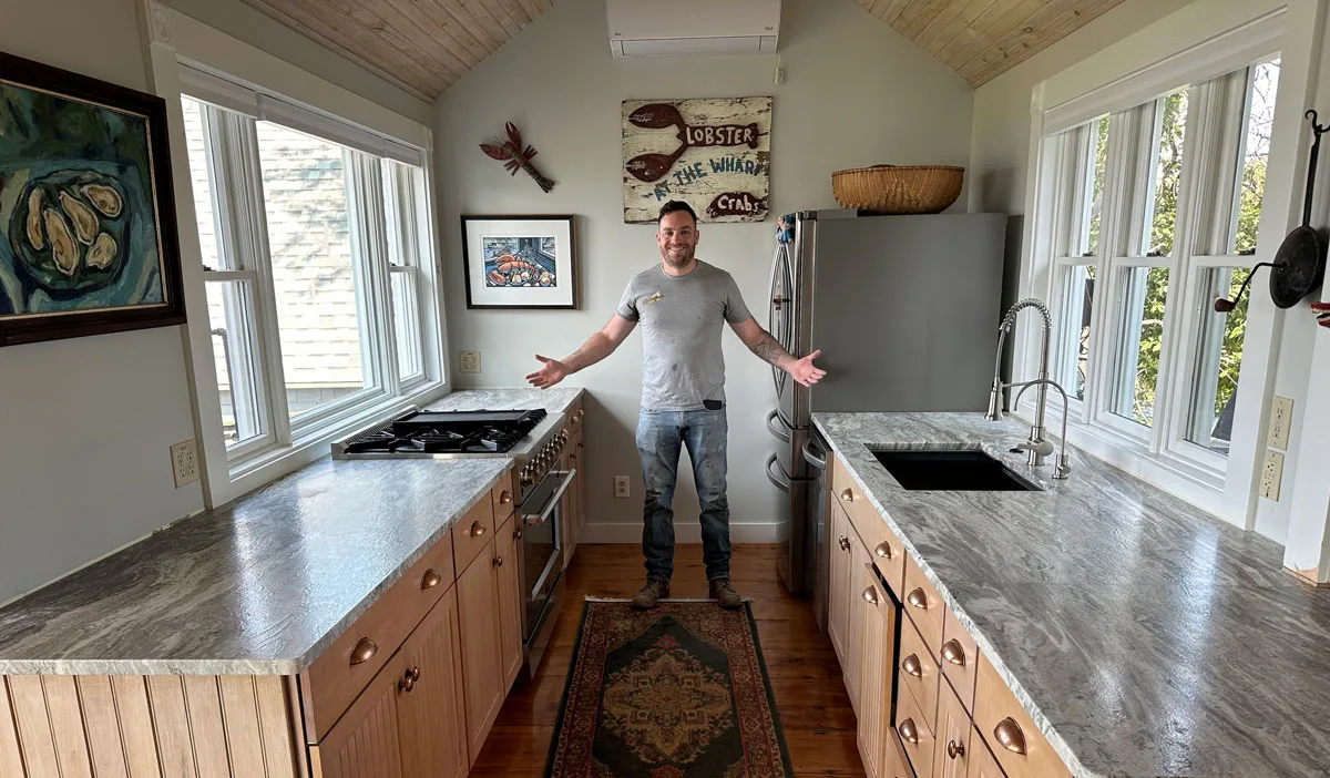 NH Kitchen and bath design By Quality Granite & Cabinetry logo
